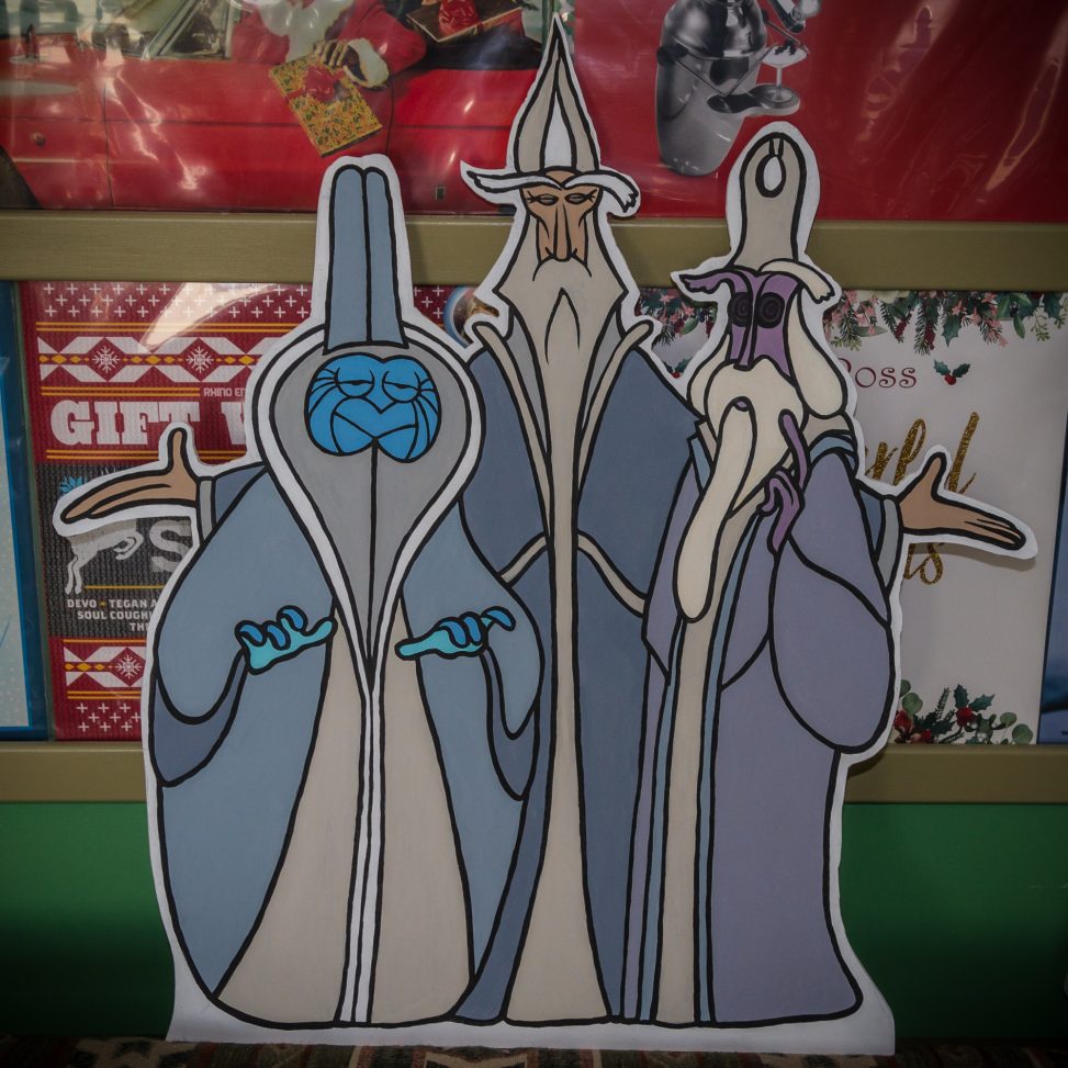 A standup cutout of the three aliens.