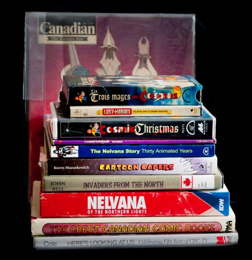 Stack of books related to A Cosmic Christmas