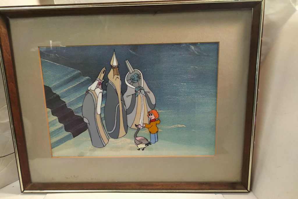 The framed cel with the aliens and Peter and Lucy.